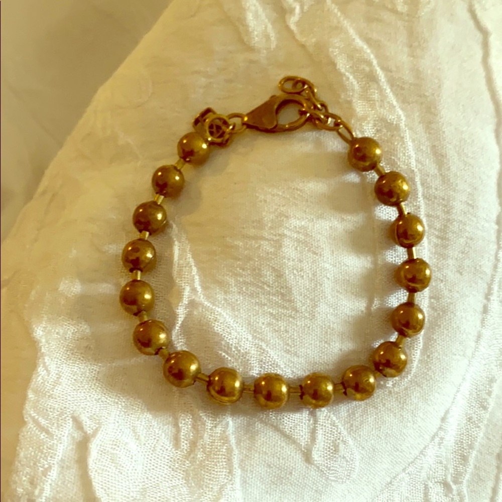 Waxing poetic brass bracelet
